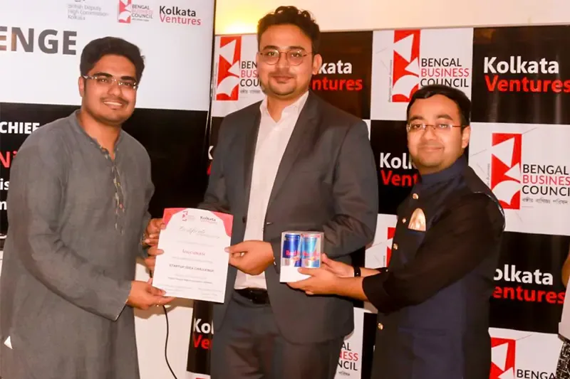Invesmate receiving a certificate at Bengal Business Council