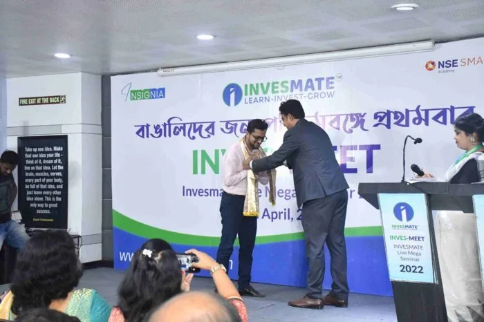 Felicitation moment at InvesMeet mega seminar